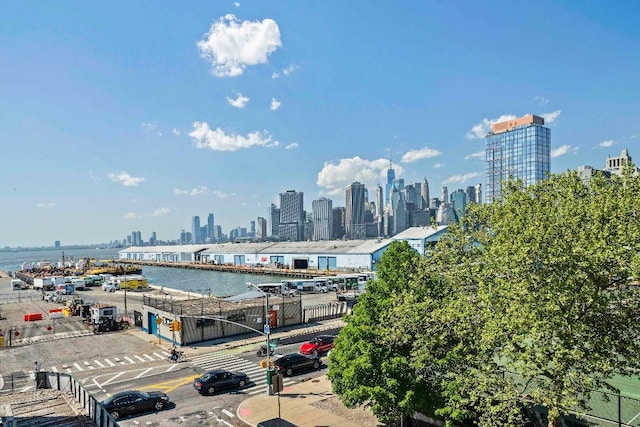 property's view of city with a water view