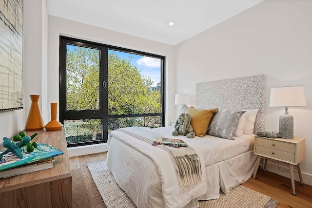 bedroom featuring light hardwood / wood-style floors