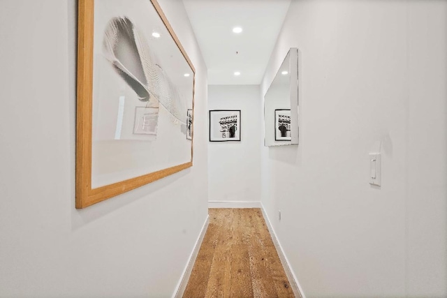 hallway featuring hardwood / wood-style flooring