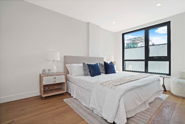 bedroom featuring hardwood / wood-style flooring