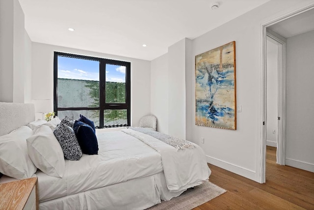 bedroom featuring hardwood / wood-style flooring