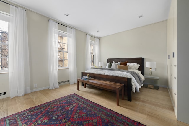 bedroom featuring light wood-type flooring