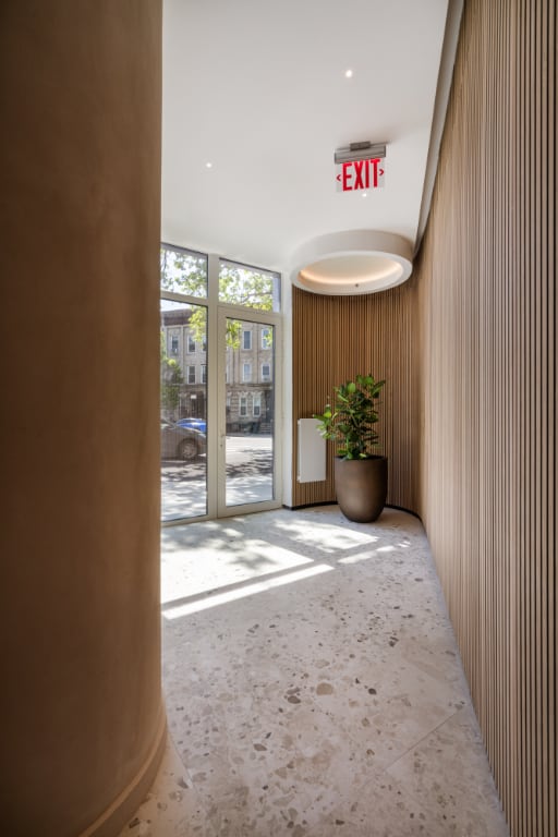 hallway with a wall of windows