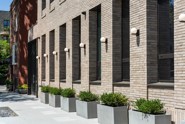 view of home's exterior with brick siding