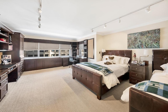 carpeted bedroom featuring ornamental molding