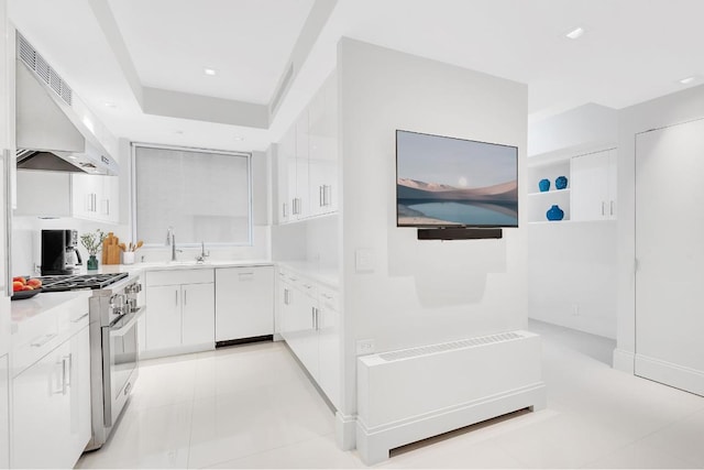 kitchen with extractor fan, white cabinetry, dishwasher, sink, and high end stainless steel range