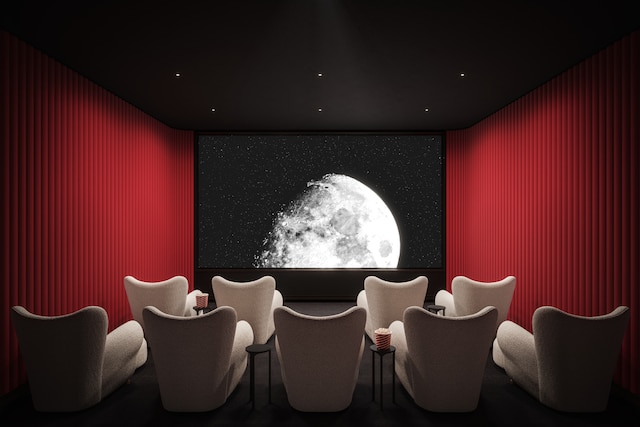 home theater room with wallpapered walls