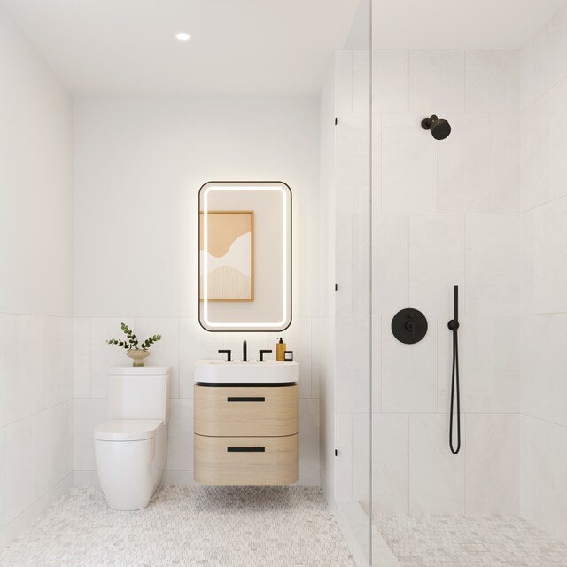 480 Kent Ave Unit 12G, New York City, NY 11249 - full bath with tile walls, toilet, tiled shower, vanity, and recessed lighting