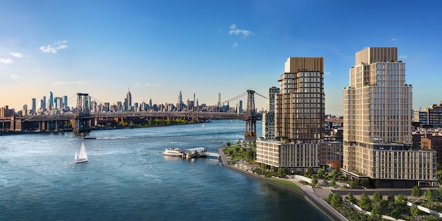 water view featuring a notable bridge and a view of skyline