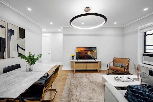 living area featuring crown molding, recessed lighting, cooling unit, and light wood-type flooring