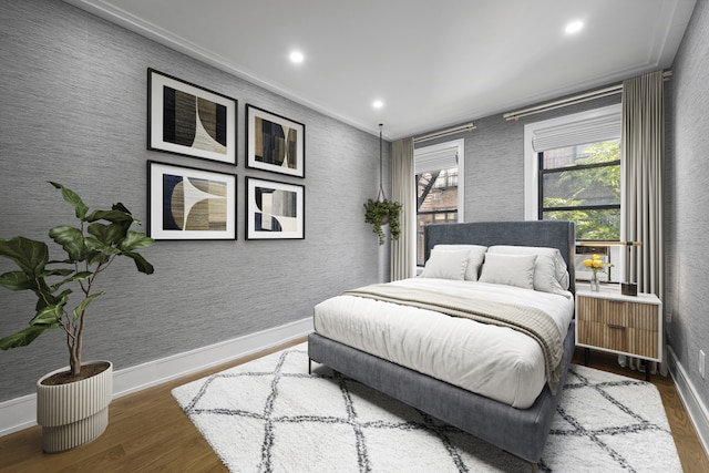 bedroom featuring recessed lighting, baseboards, and wood finished floors