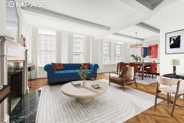 living room featuring beamed ceiling, parquet floors, a premium fireplace, and a healthy amount of sunlight