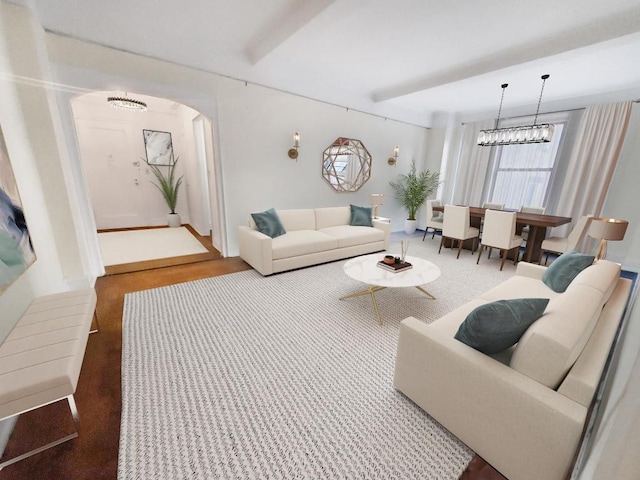 living room with a notable chandelier