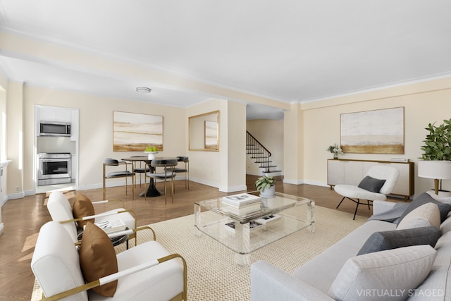 living room featuring ornamental molding and parquet floors