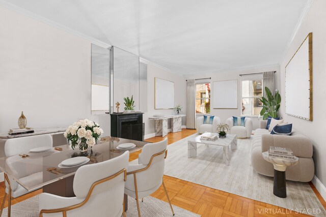 living room with crown molding and light parquet floors