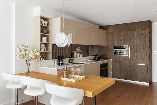 kitchen featuring a sink, black oven, oven, gas stovetop, and open shelves