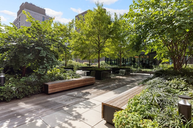 surrounding community featuring a deck