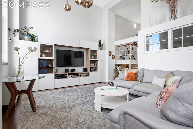 living room with a high ceiling