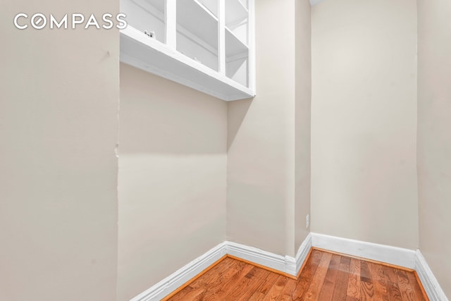 room details featuring wood finished floors and baseboards