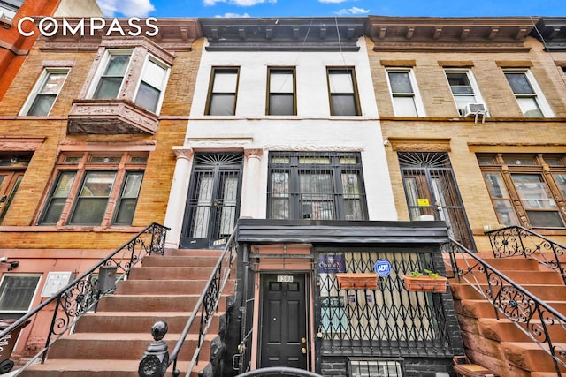 townhome / multi-family property with stairway