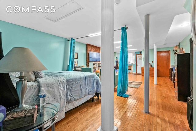 bedroom featuring wood-type flooring