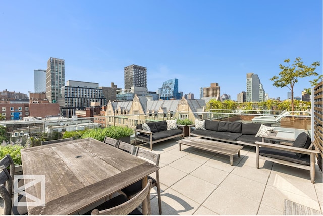 view of patio featuring a view of city and an outdoor hangout area