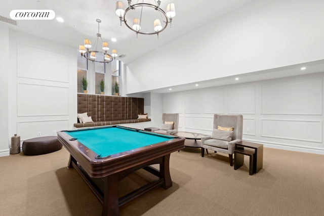 rec room with a chandelier, a decorative wall, carpet flooring, billiards, and recessed lighting