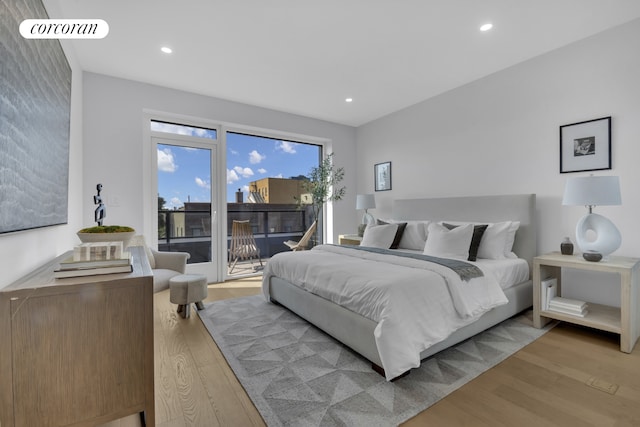 bedroom featuring recessed lighting, light wood-type flooring, and access to outside