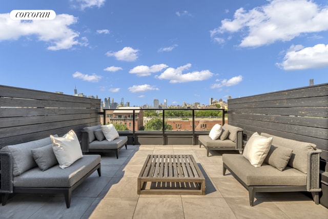 view of patio with an outdoor hangout area and a balcony