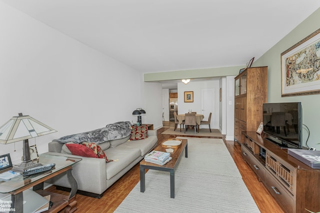 living area with wood finished floors