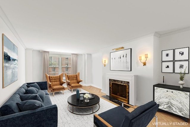 living room with a high end fireplace, crown molding, and parquet flooring