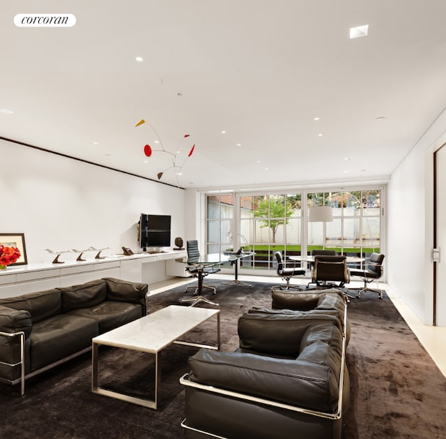 living room featuring expansive windows