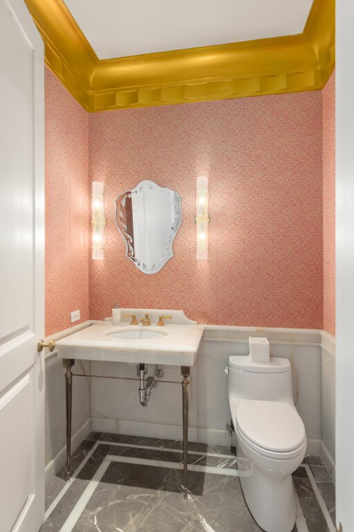 hallway featuring elevator and crown molding