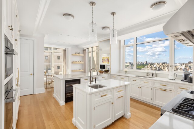 bedroom with ceiling fan, light hardwood / wood-style floors, and crown molding