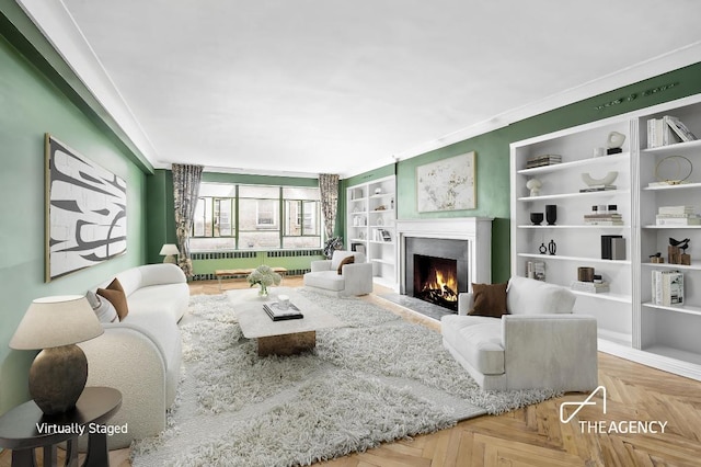 living room with ornamental molding, light parquet flooring, and radiator heating unit