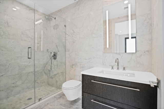 bathroom featuring visible vents, toilet, marble finish floor, a marble finish shower, and vanity