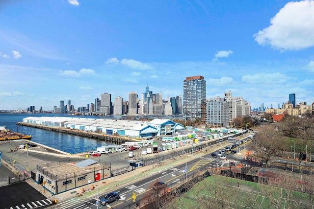 property's view of city featuring a water view