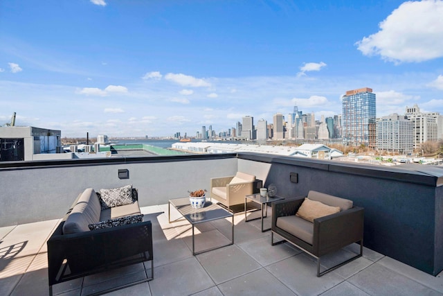 view of patio / terrace featuring a city view and outdoor lounge area