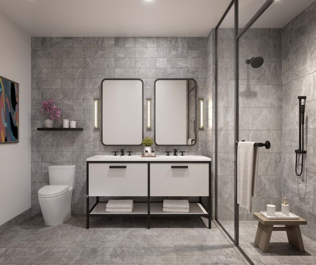 bathroom with vanity, a shower, tile walls, and toilet