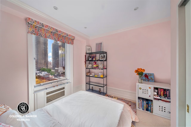 bedroom with crown molding and an AC wall unit