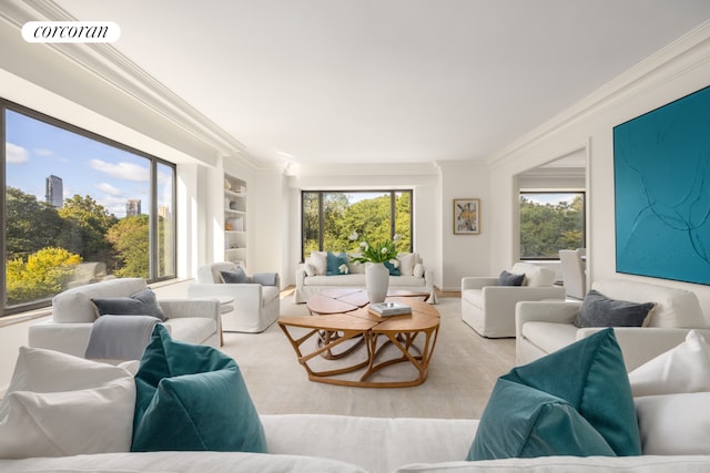 living room featuring built in features, visible vents, and crown molding