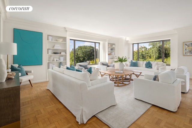 living area featuring built in features, a wealth of natural light, visible vents, and crown molding