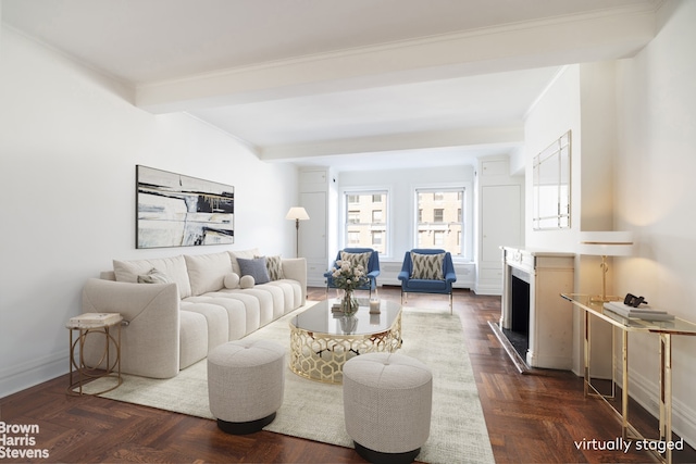 living room featuring beamed ceiling, a fireplace, and baseboards