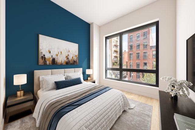 bedroom featuring hardwood / wood-style floors