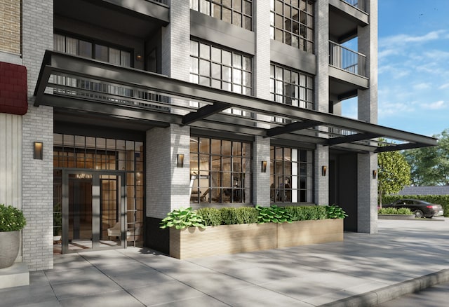 11-32 31st Ave Unit 5C, New York City, NY 11106 - doorway to property featuring brick siding