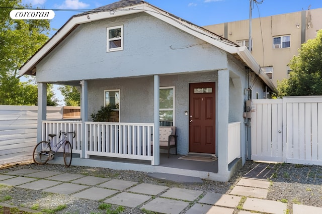 view of front of house featuring covered porch