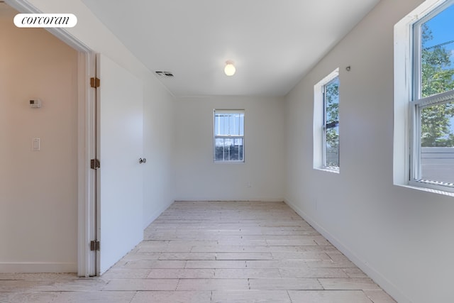 empty room featuring light hardwood / wood-style floors