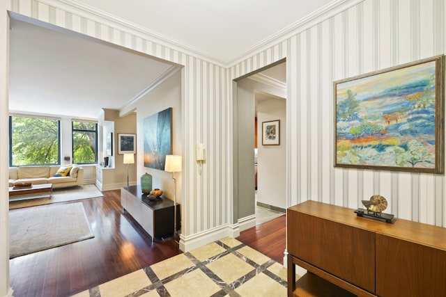 living room featuring crown molding and hardwood / wood-style flooring