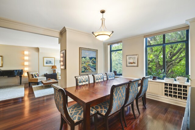 living room featuring dark wood-type flooring and ornamental molding