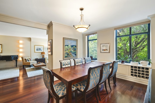 dining area with dark wood-type flooring, crown molding, and floor to ceiling windows